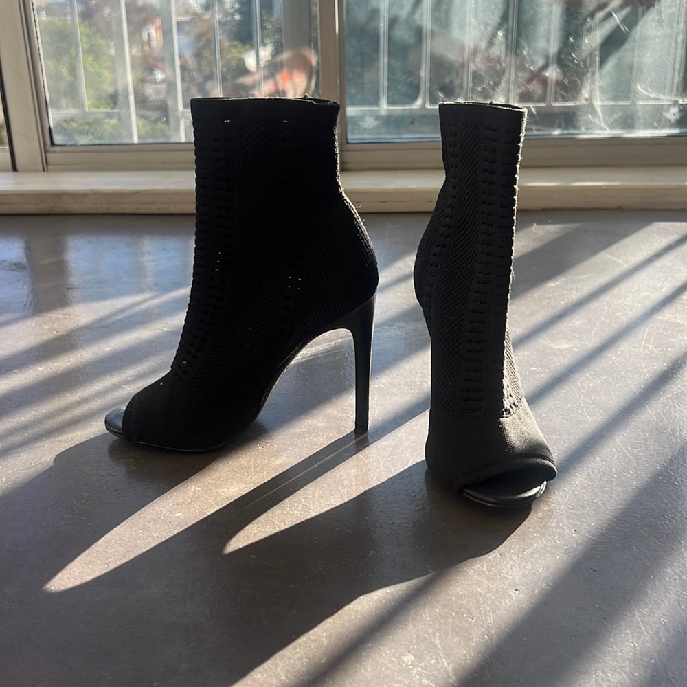 3 in heels. Stretch toe free booties. Nice stretch but retain its natural shape.